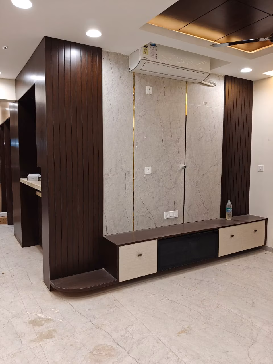 Minimalist wall-mounted TV console design with storage compartments