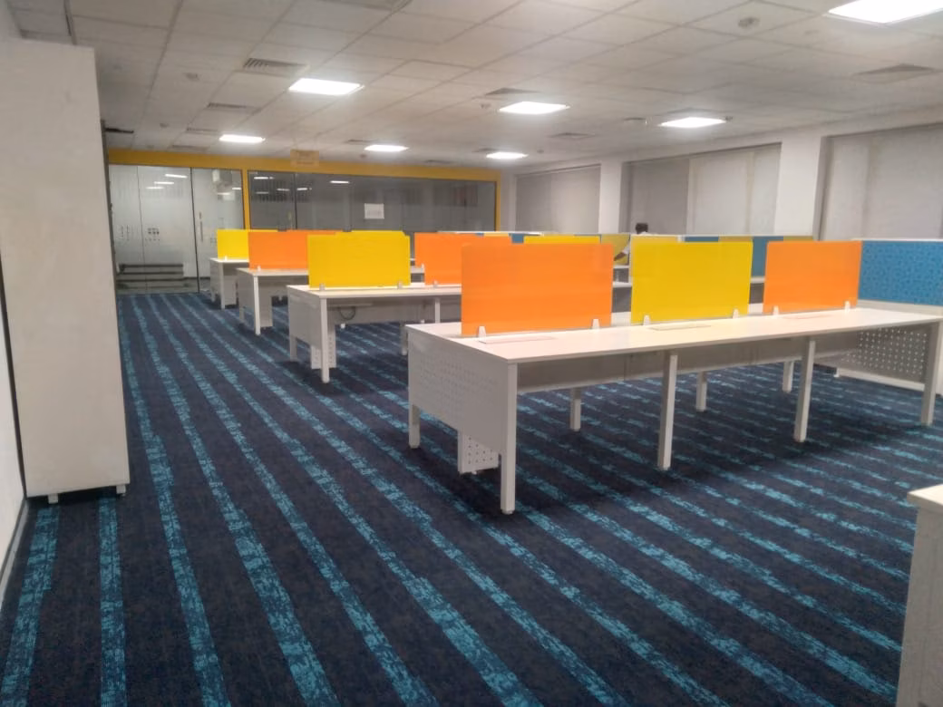 Compact office meeting room interior with whiteboards and video conferencing layout